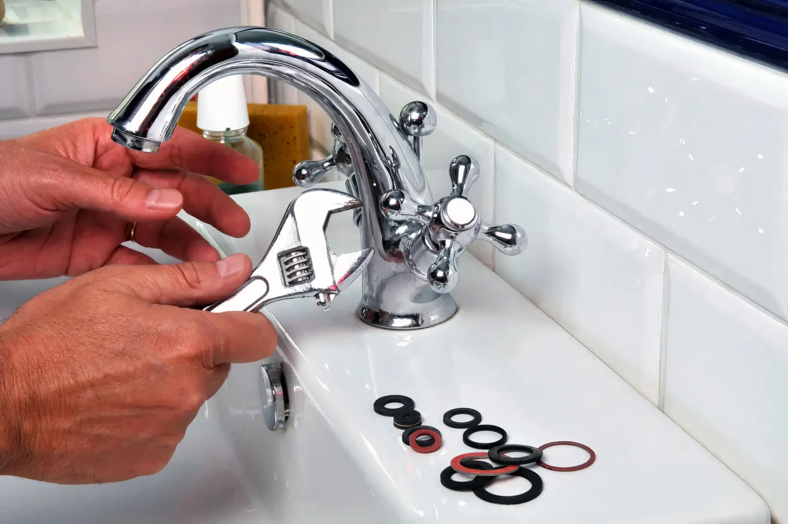 Plumber maintaining a bathroom faucet in Santa Clarita