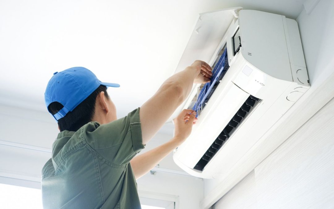 HVAC technician servicing a ductless mini split in Santa Clarita